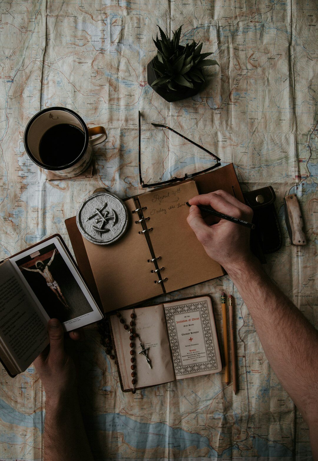 senior writing travel journal